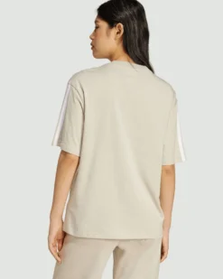 ADIDAS - T-SHIRT DONNA MEZZA MANICA  BEIGE CON 3 BANDE BIANCHE  ESSENTIALS 3-STRIPES - JE1219