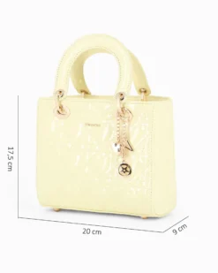 NARDINI - Borsa piccola gialla due manici effetto vernice trapuntata con cuori e ciondoli, tracolla removibile