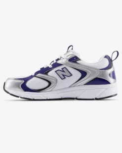 NEW BALANCE -  SNEAKERS LIFESTYLE  BIANCA CON DETTAGLI SILVER, BLU E NERI,  U40825M