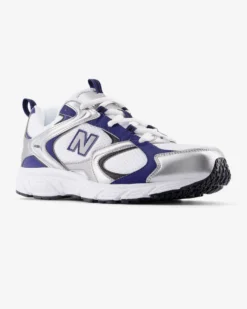 NEW BALANCE -  SNEAKERS LIFESTYLE  BIANCA CON DETTAGLI SILVER, BLU E NERI,  U40825M