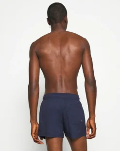 PUMA - Costume da bagno pantaloncino corto blu scuro con logo bianco