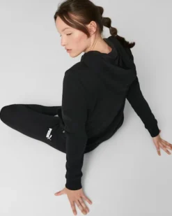 PUMA - Felpa da donna nera con cappuccio e logo color bronzo