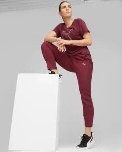 PUMA - Pantalone tuta da donna a vita alta bordeaux in tessuto traspirante