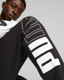 PUMA - Pantalone tuta da uomo nero con logo bianco