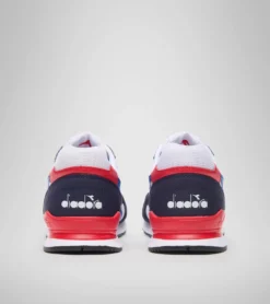 PUMA - Sneakers bianca e blu con dettagli rossi, numerata 36/39 - N 92 GS