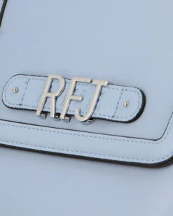 RIFLE - Zaino celeste con tre scomparti principali e lettere logo scorrevoli sulla patta