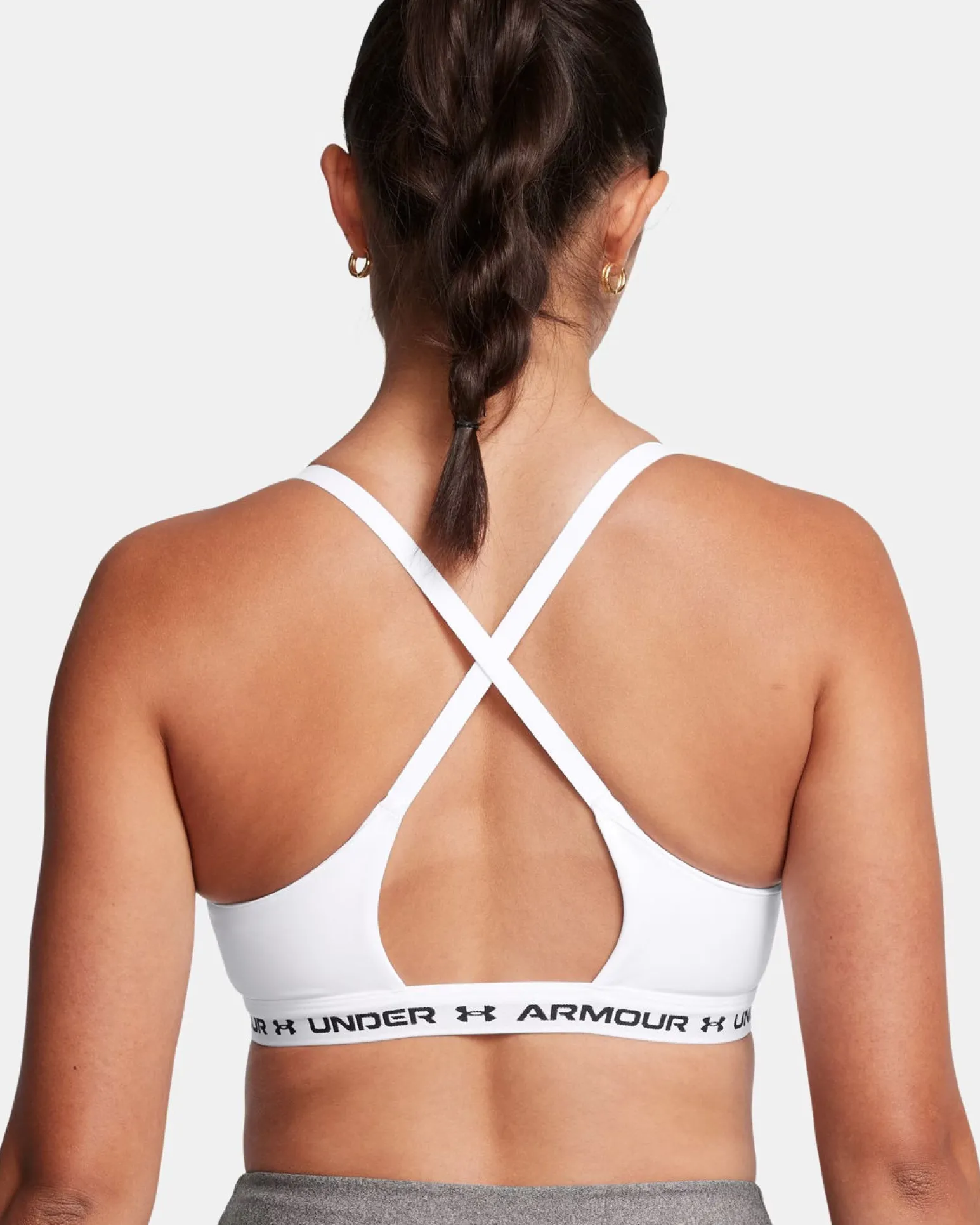 UNDER ARMOUR - REGGISENO SPORTIVO CROSSBACK LOW BRA ULTIMAT BIANCO DA DONNA, 1386424_0100