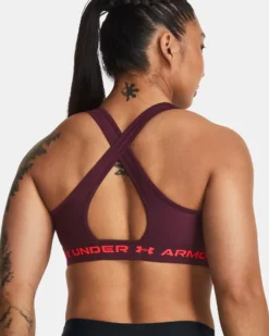 UNDER ARMOUR - Top bordeaux ultra aderente in tessuto traspirante con banda logo rosa